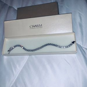 SWAROVSKI TENNIS BRACELET by Charm Diamond Centres